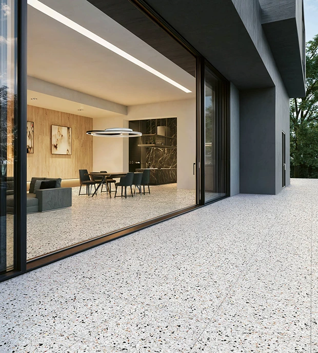 Pavimento esterno in gres porcellanato effetto seminato per terrazza moderna