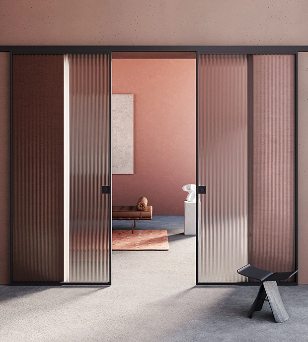 Porte scorrevoli moderne in vetro cannettato con telaio nero
